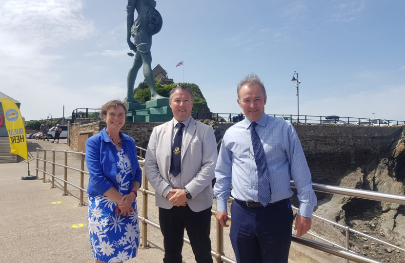 Selaine Saxby standing in front of the Verity statue in Ilfracombe