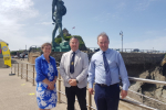 Selaine Saxby standing in front of the Verity statue in Ilfracombe